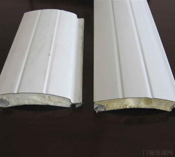 专门生产装修铝合金电动55*77型材卷帘门