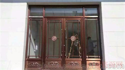 山东潍坊牟平仿铜门恒宇金属仿铜门价格_13573680983