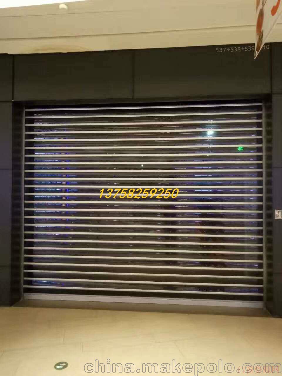 浙江杭州定做铝合金直条水晶门/杭州铝条透明卷闸门生产厂家_卷帘门_13588401424