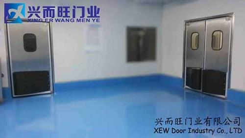 供应  定制郑州不锈钢自由门 防撞门  兴而旺门业