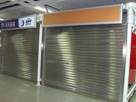 太原尖草坪安装维修电动卷帘门电机遥控器 玻璃维修